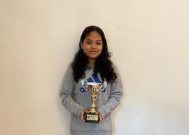 Student with a trophy